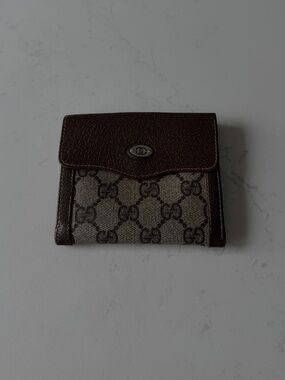 Gucci Authentic vintage compact bifold wallet featuring the iconic GG monogram